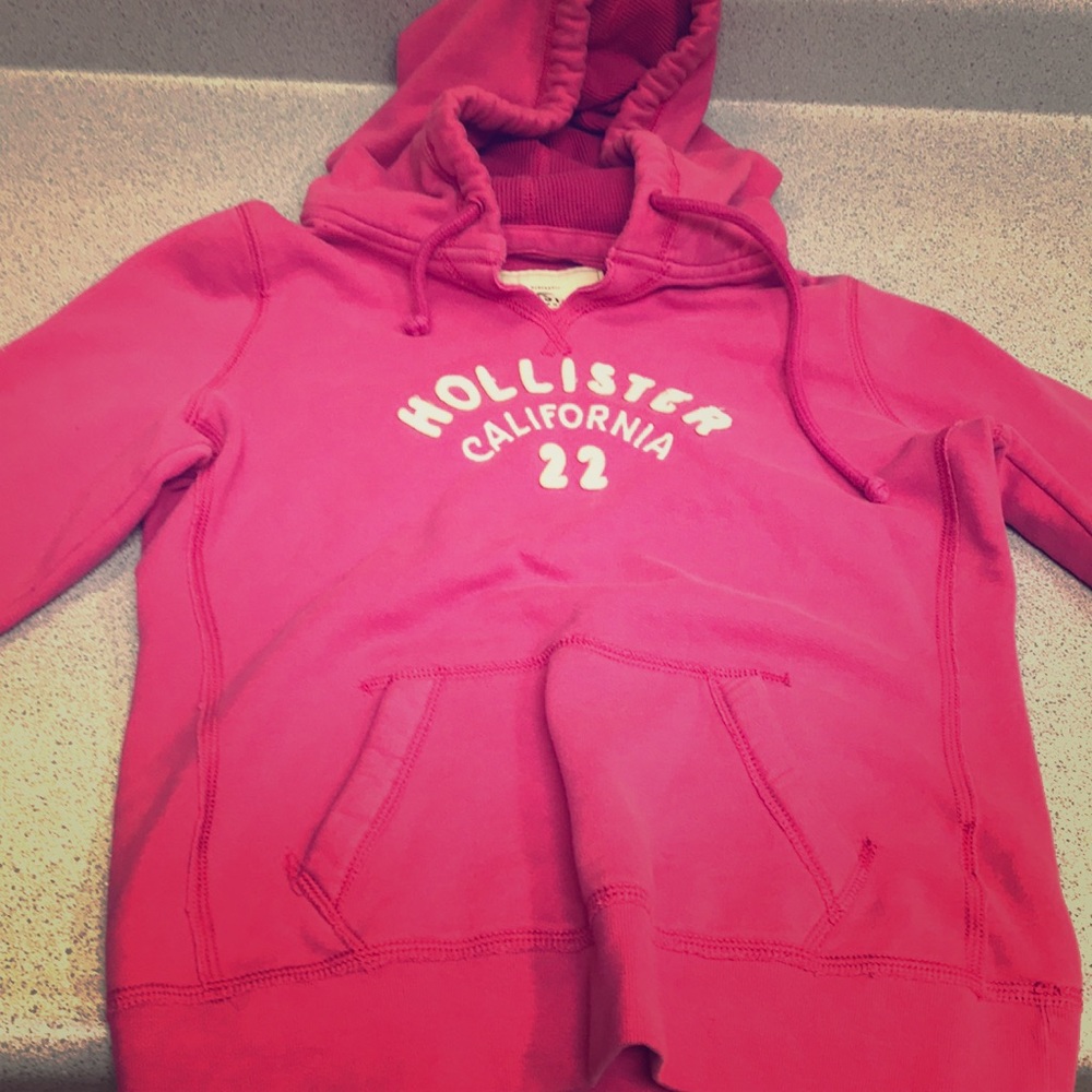 Pink Hollister hoodie.
